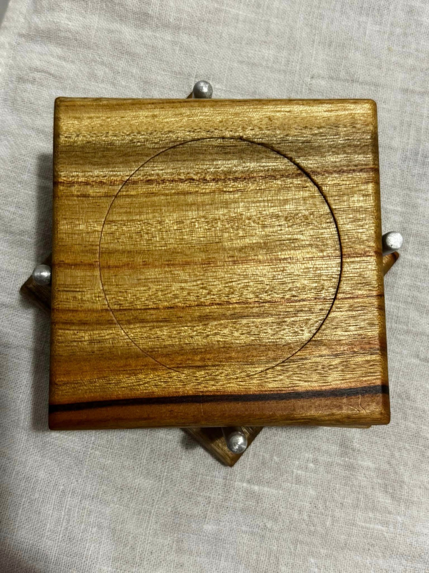 Handcrafted timber drink coasters.