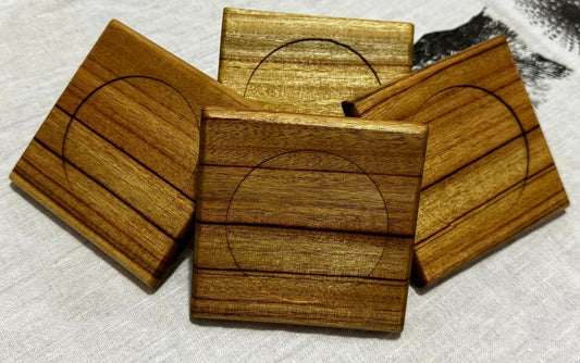 Handcrafted timber drink coasters.